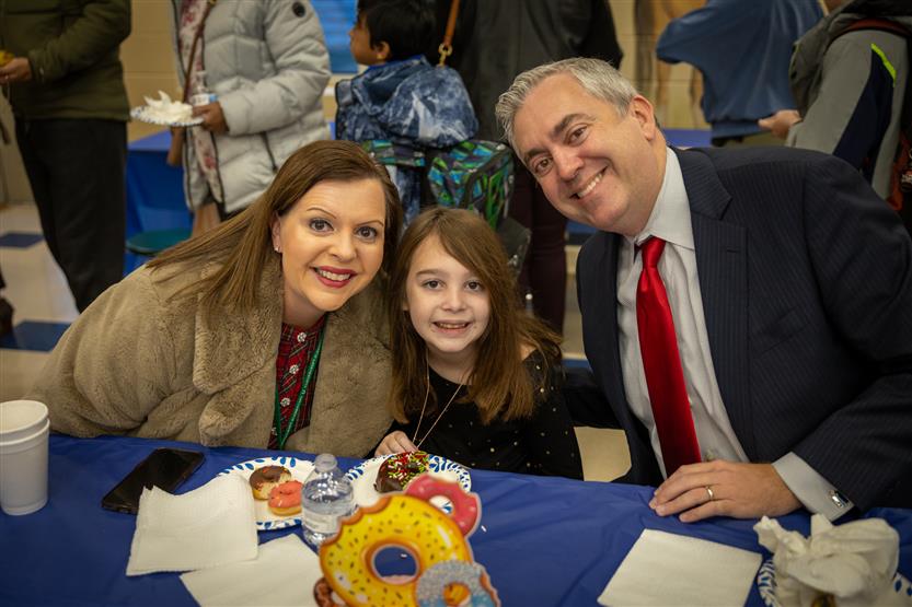 Students enjoy pastries with their parents